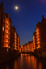 Speicherstadt Hamburg illuminated with river at night long exposure | Hamburg, Germany