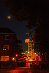 Large container crane illuminated in the port of Hamburg at night | Hamburg, Germany