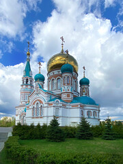 Fototapeta na wymiar Russian Orthodox Church. Uspensky (Dormition) cathedral of Omsk, Russian Federation. Summertime.