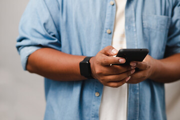 concept of mobile technology Businessmen use smartphones while working at home or office.
