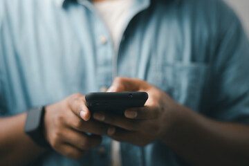 concept of mobile technology Businessmen use smartphones while working at home or office.
