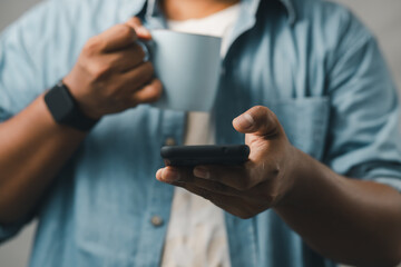 concept of mobile technology Businessmen use smartphones while working at home or office.
