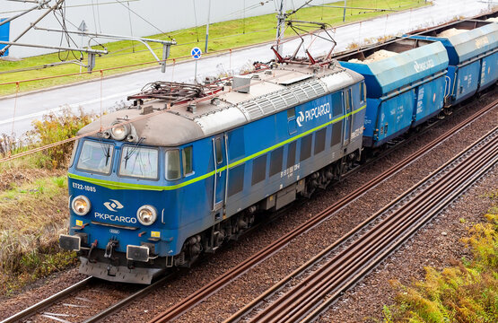 Krakow, Poland, polish PKP cargo train front closeup, rail transportation and logistics abstract concept. Freight train moving, electric locomotive vehicle