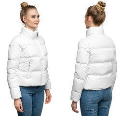 Young woman model posing in white down jacket isolated on white background