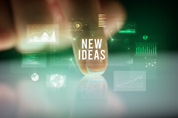 Finger touching tablet with business graphs and icons concept