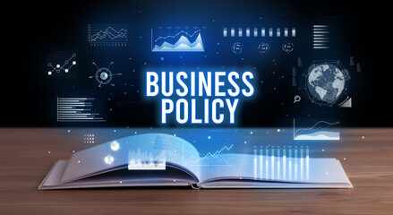 Business inscription coming out from an open book