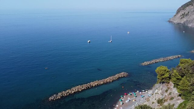 Europe, Italy , Liguria, Framura , Cinque Terre National park - Drone aerial view of the mediterranean cost , Rena and  La Valla beach with beautiful sea - new pedestrian  walking La via del mare