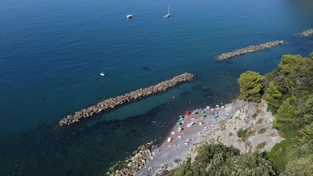 Europe, Italy , Liguria, Framura , Cinque Terre National park - Drone aerial view of the mediterranean cost , Rena and  La Valla beach with beautiful sea - new pedestrian  walking La via del mare