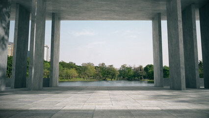 Empty space for products show in concrete hallway with park background.