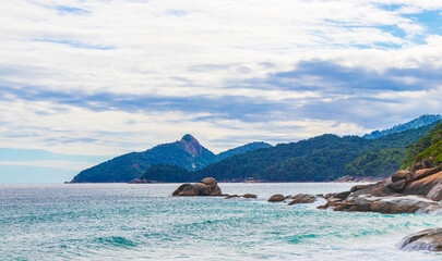 Rocks waves Praia Lopes Mendes beach Ilha Grande island Brazil.