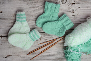 Mint color small newborn socks made of  soft cotton yarn