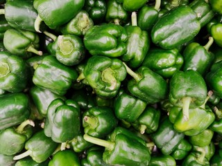 Obraz na płótnie Canvas green peppers at the market