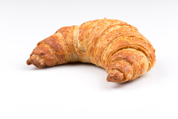 Croissant over white background