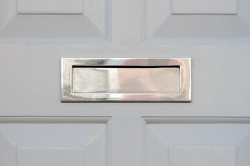 Old letterbox in the door, traditional way of delivering letters to the house, old mailbox - obrazy, fototapety, plakaty