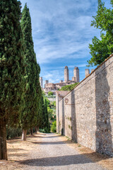 San Gimignano, Italy- July 18, 2021: View of the famous medieval city in Tuscany, famous for its ancient buildings and towers
