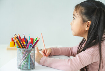 children's creativity. happy child draw and paint is a leisure activity.