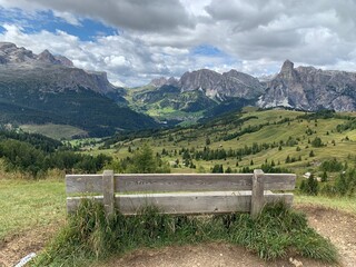 Relaxing after hiking and biking by enjoying the view of Pizes de Cir - Cirspitzen Panorama in the Dolomites Mountanis in South Tyrol Italy.