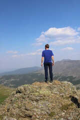 hiker on top of mountain