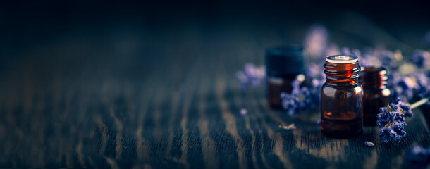 Sample drams with essential oils and lavender flowers, long banner