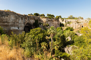 Fototapeta na wymiar Natural Sceneries of The Latomia del Paradiso in The Neapolis Archaeological Park in Syracuse, Sicily, Italy.