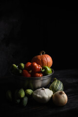 autumn still life in a rustic style on a dark wooden background