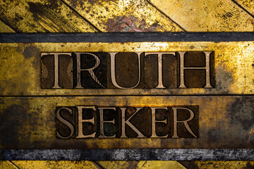 Truth Seeker text message on textured grunge copper and vintage gold background