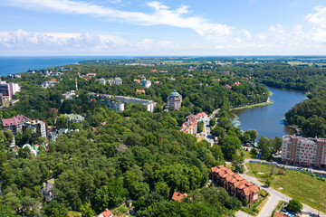 European city with park. Aerial view on Svetlogorsk town and Tikhoe lake