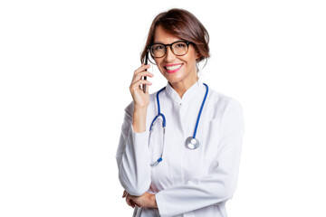 Fototapeta premium Smiling female doctor having a phone call while standing at isolated white background