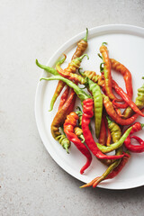 Fresh red and green peppers.