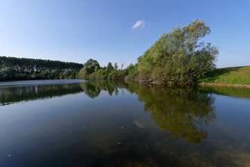 Fototapeta na wymiar Pond in La Bassée national nature reserve. Ile-de-France region