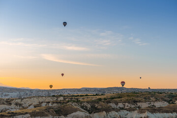 Low number of balloons due to quarantine. The great tourist attraction of Cappadocia - balloon flight. Entertainment, tourism an vacation. Travel tour. Goreme, Cappadocia, Turkey.