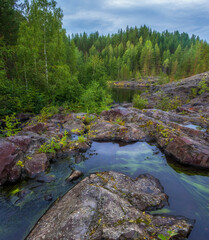 green algae in water on Poor porog, threshold, on the river Suna Karelia, Russian landscape summer