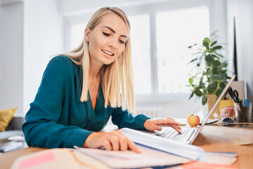 Businesswoman working from home office. Female student learning at home