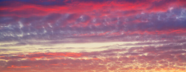 Beautiful sunset sky abstract background. Sky with red pink clouds. Nature background.