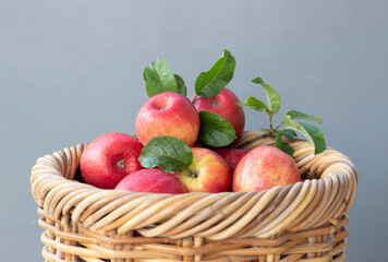 Red apples in a braided basket