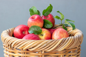 Red apples in a braided basket