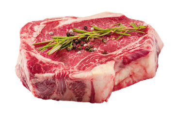 Raw beef steak isolated on white. Beef meat with rosemary and pepper.