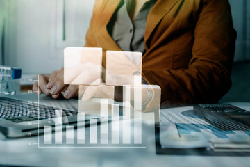 Fototapeta premium Hand arranging wood cube stacking. Business concept growth success,hand stack woods block step on table. business development concept.copy space.
