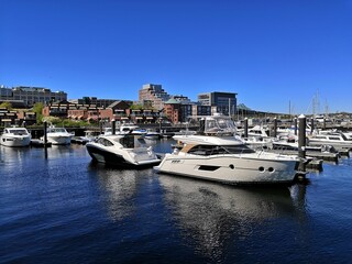 Fototapeta na wymiar Yachts at the pier on sunny day in Boston Charlestown