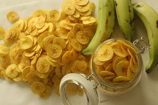 Fried banana chips made by deep frying under ripe banana slices. A main item of vegetarian Onam meals popularly called ethakka upperi