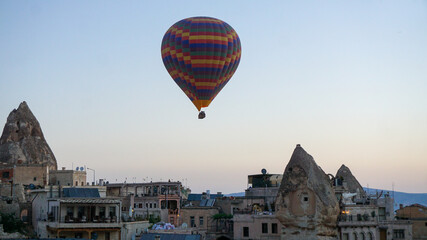 Hot air balloons launch in the Goreme national park in Cappadocia, Turkey. Colorful balon flying over. Cappadocia's greatest tourist attraction is ballooning.  © Motionic Studio