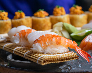 Assorted japanese sushi ans sashimi on a table