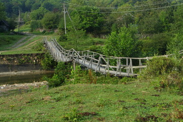 Wooden bridge over the river