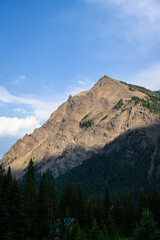 Sharp mountain peak on a sunny blue sky day, Cooke City, Montana, USA
