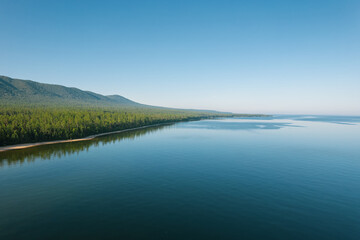 Summertime imagery of Lake Baikal is a rift lake located in southern Siberia, Russia. Baikal lake summer landscape view. Drone's Eye View.