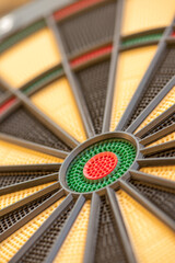 Close-up of a dartboard with pinholes for the darts