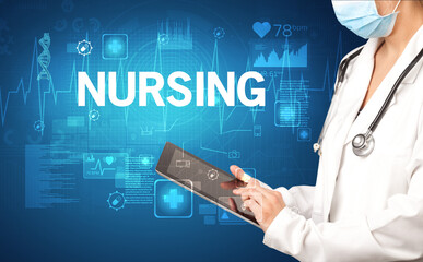 young doctor writing down notes