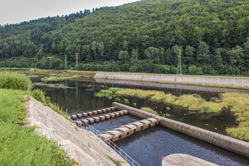 Fototapeta na wymiar The Porąbka Dam - a dam built in 1928–1937 in Międzybrodzie Bialskie. It dams up the waters of the Sola River