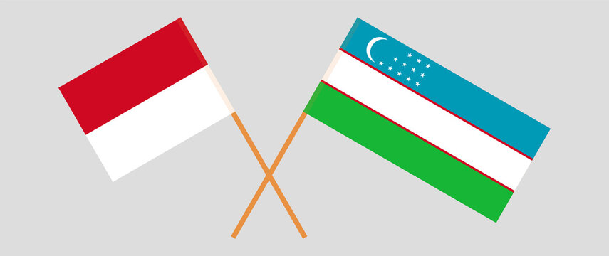 Crossed flags of Monaco and Uzbekistan. Official colors. Correct proportion