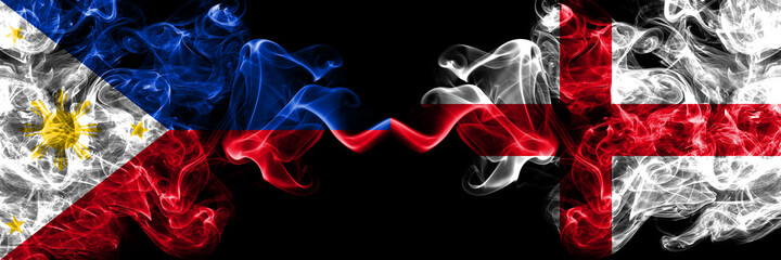 Philippines, Filipino vs England, English smoke flags side by side.